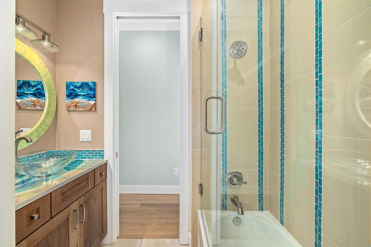 Shared hall/ bunk room bathroom with tub/shower combo