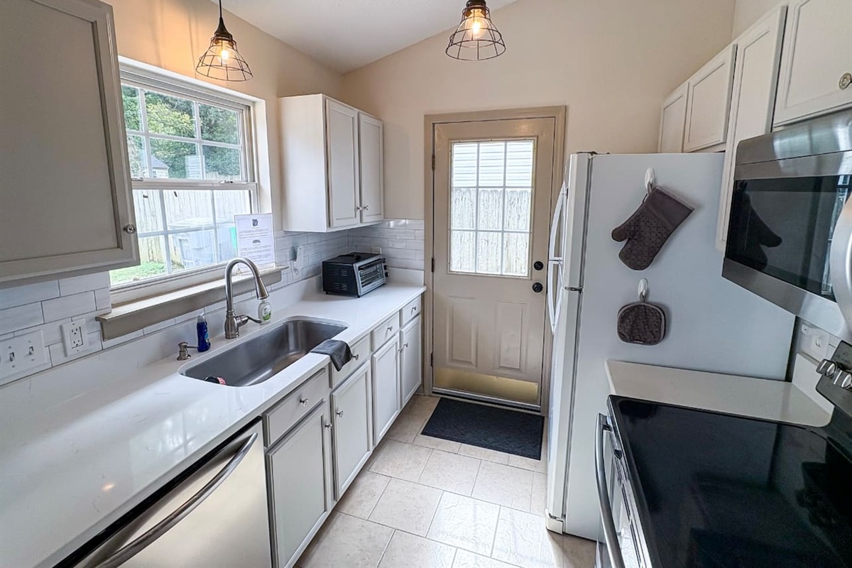 Fully stocked Kitchen with natural light