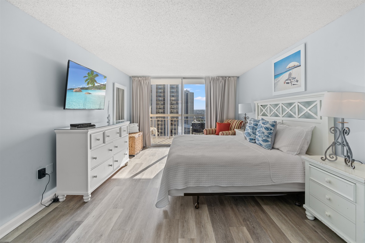 Spacious Main Bedroom with King Bed, ensuite and Balcony access