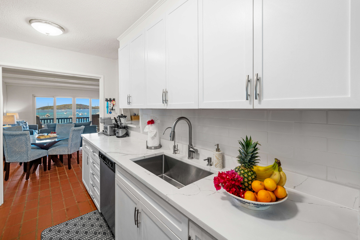 Thoughtfully designed kitchen overlooking the living area, perfect for entertaining.