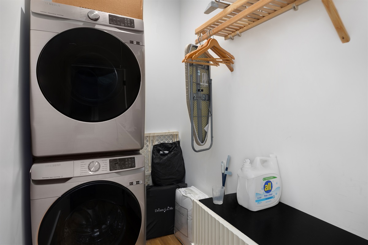 {Laundry Room} A clean, streamlined laundry space with full-size machines—perfect for refreshing adventure gear or keeping things easy during longer stays at Gallery House.