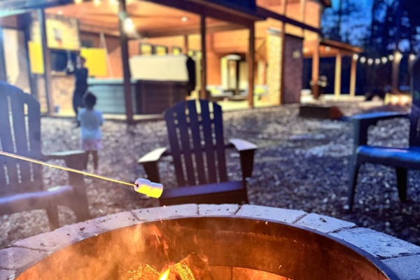 Firepit area perfect for gathering, roasting s’mores, and enjoying cozy nights under the stars with family and friends.