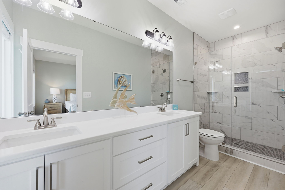 Start and end your day in the spa-inspired ensuite featuring a double vanity and walk-in shower