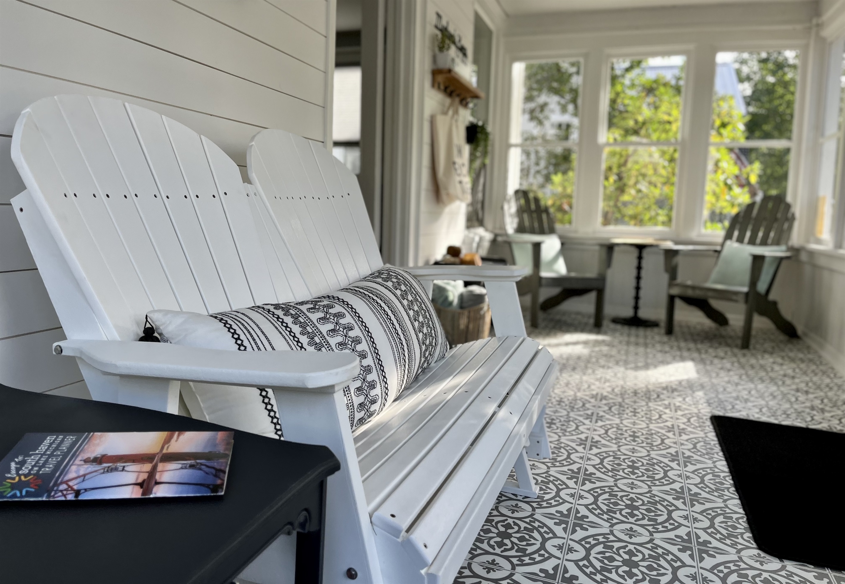 The picturesque front porch is the perfect place to relax with your morning cup of coffee or reminisce about your fun filled day in South Haven. This welcoming space really adds to the beach town feel that Marlowe's Haven exudes. 