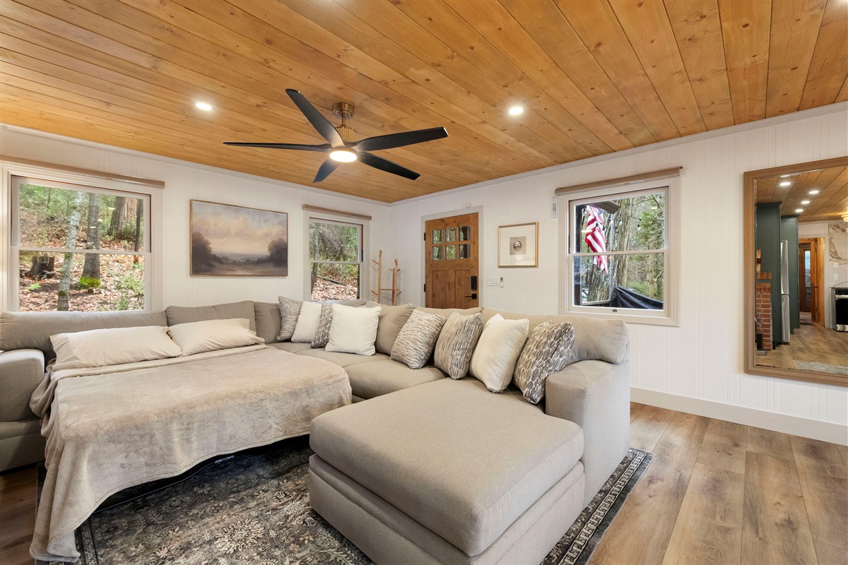 Pull out queen memory foam bed in living room. Additional sleeping on the couch as well.