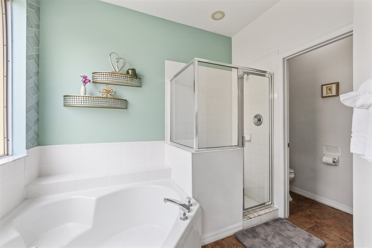 Spacious Bathroom with Jacuzzi and Walk In Shower