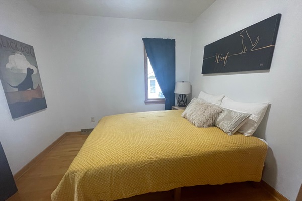 Queen guest bed with closet.