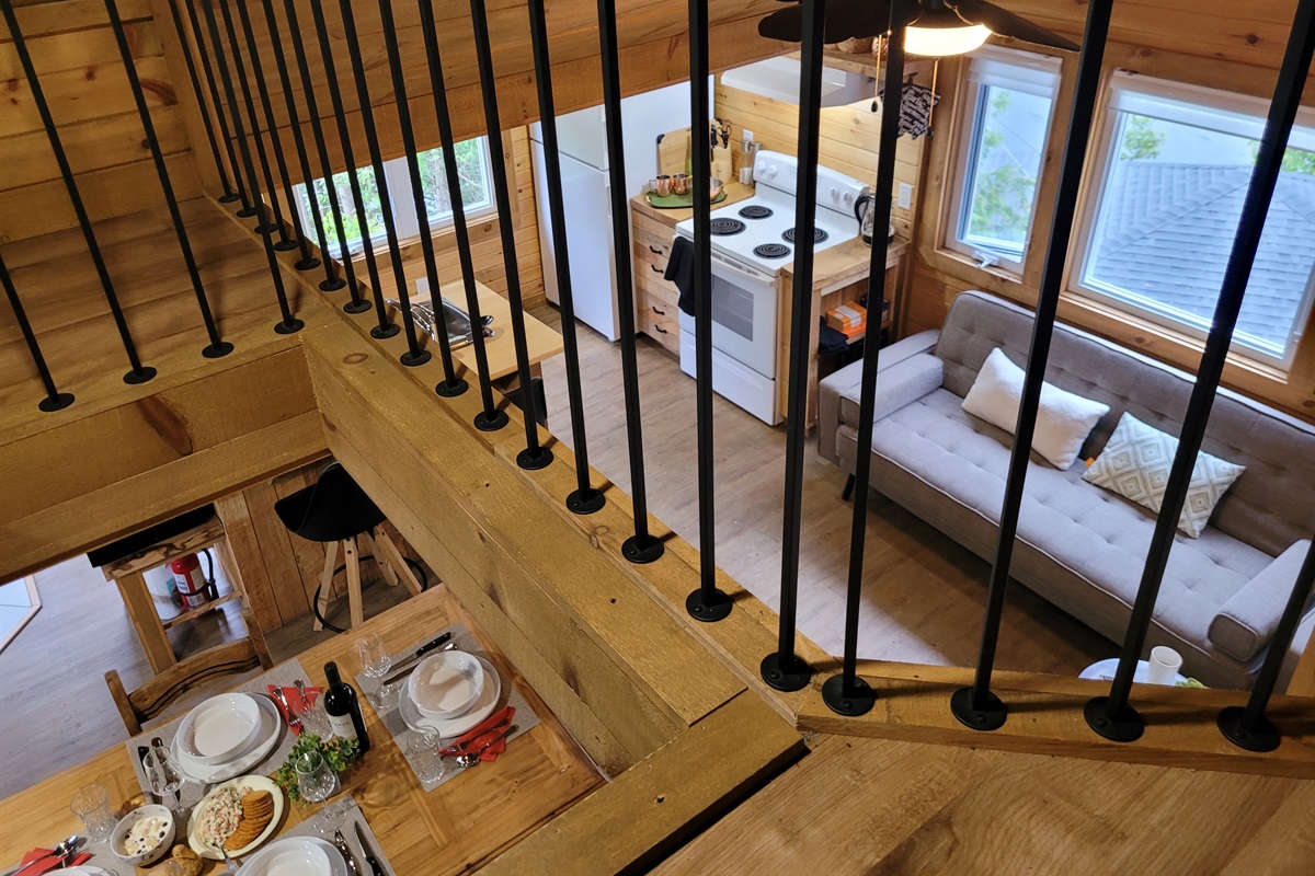 View from sleeping loft to main floor area