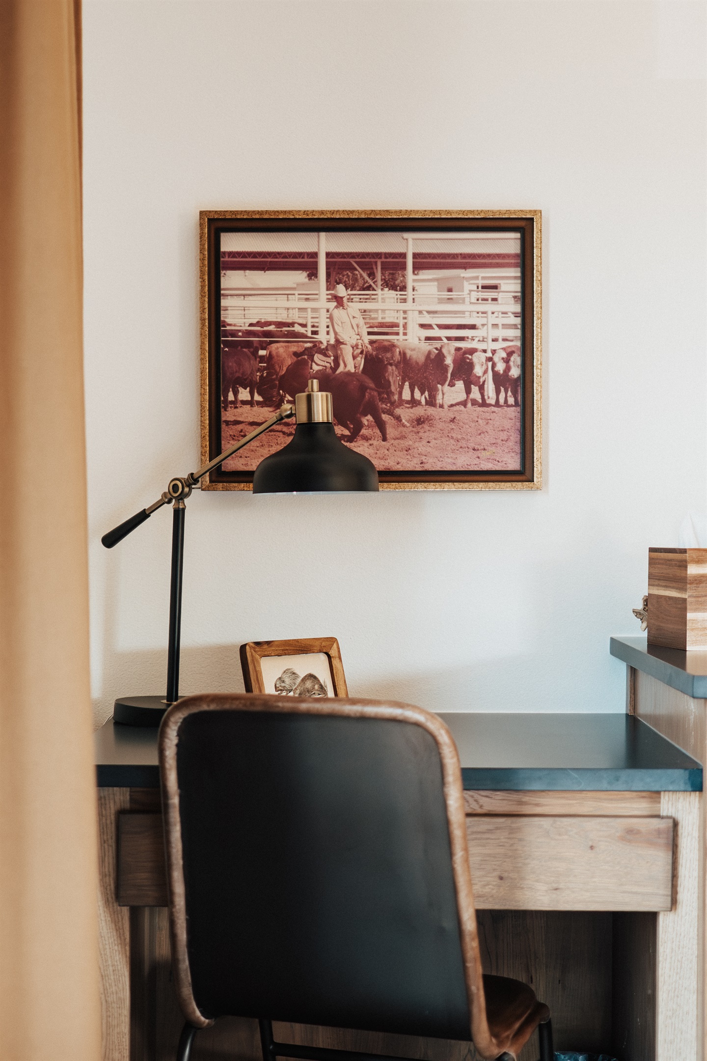 In-suite work desk at the Lazy Spur Suite — high-speed Wi-Fi and a dedicated workspace at Gaines Ranch on the Square, built for remote work and business travel.