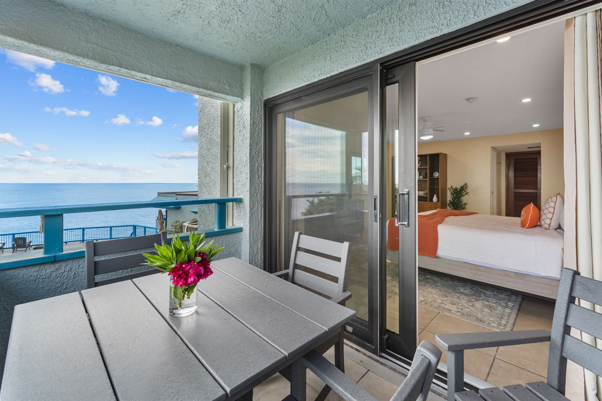 Walk from your bedroom to the balcony that have open views of the sea and the pool