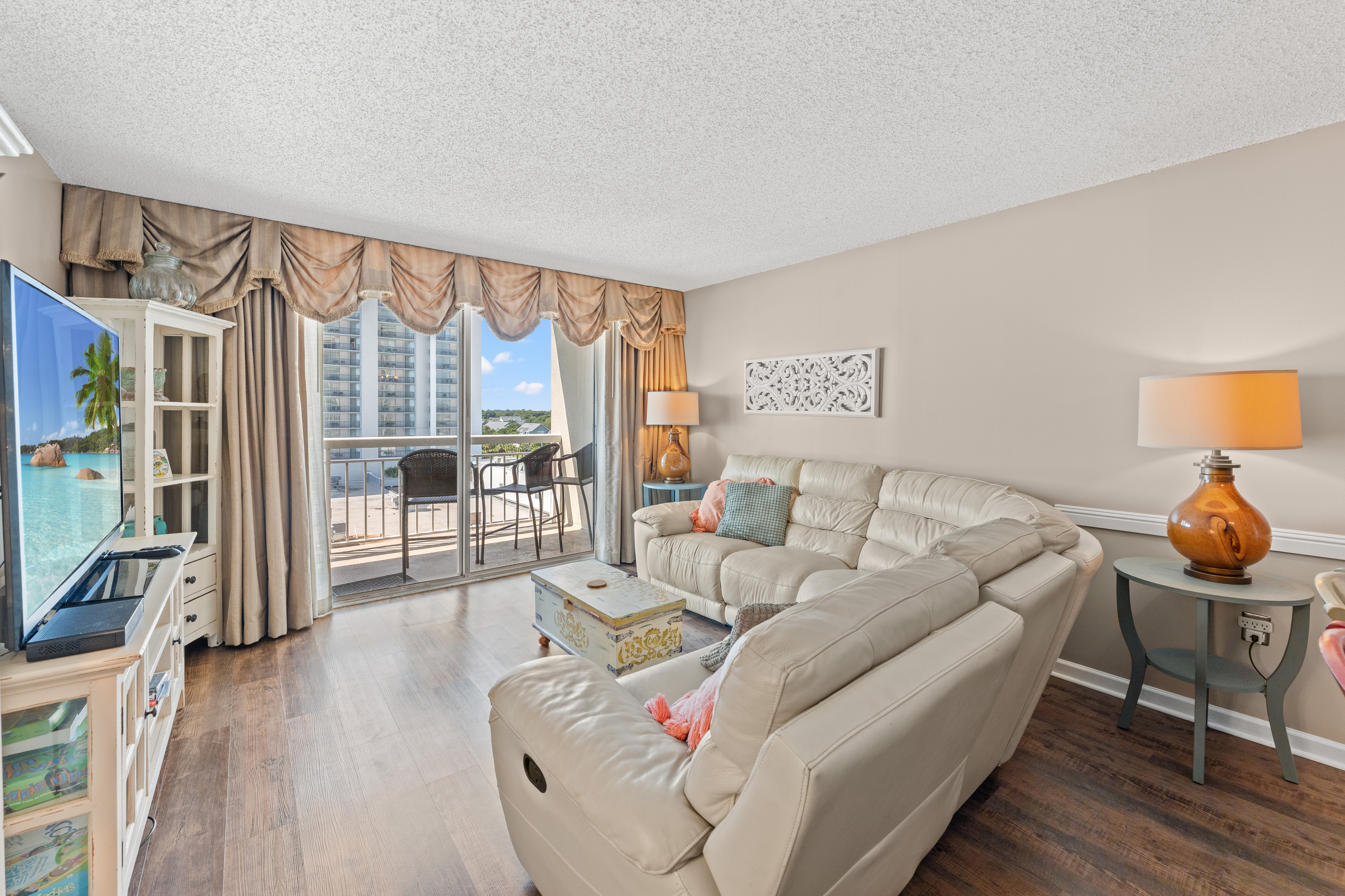 Huge Living Room with large TV and balcony access 