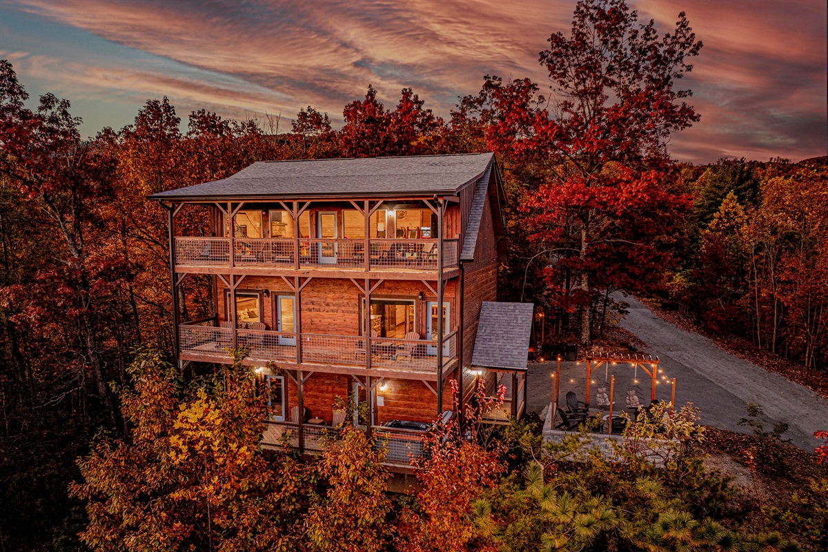 Stunning 3-story cabin surrounded by vibrant seasonal color.