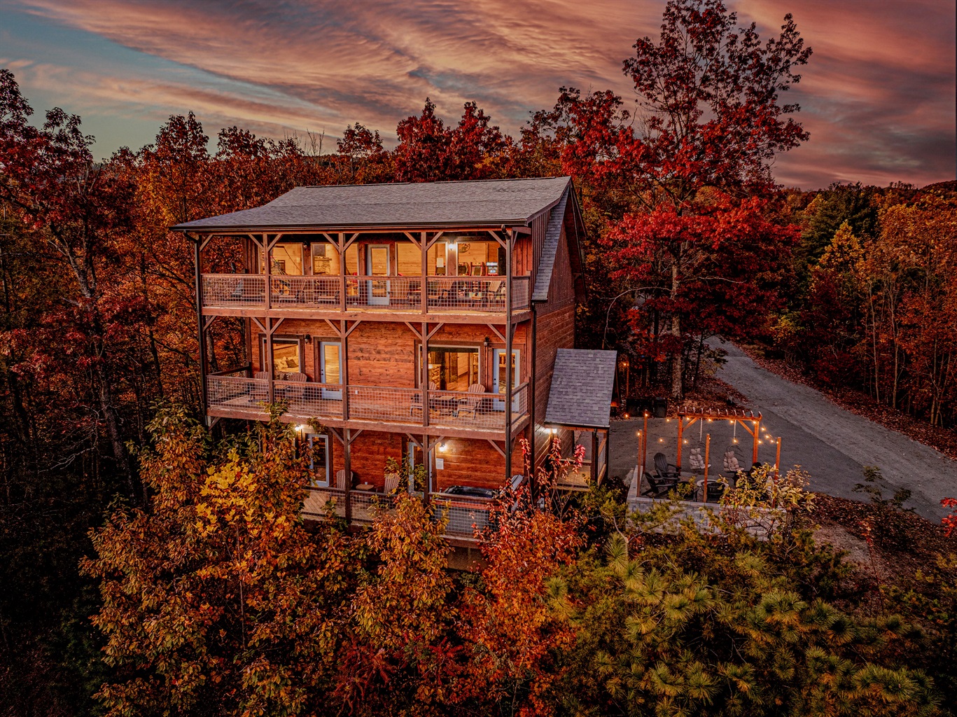Stunning 3-story cabin surrounded by vibrant seasonal color.