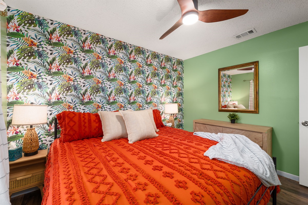Primary Bedroom 2 - King size bed, 55" TV, full closet and dresser. Cozy and tropical feeling space!