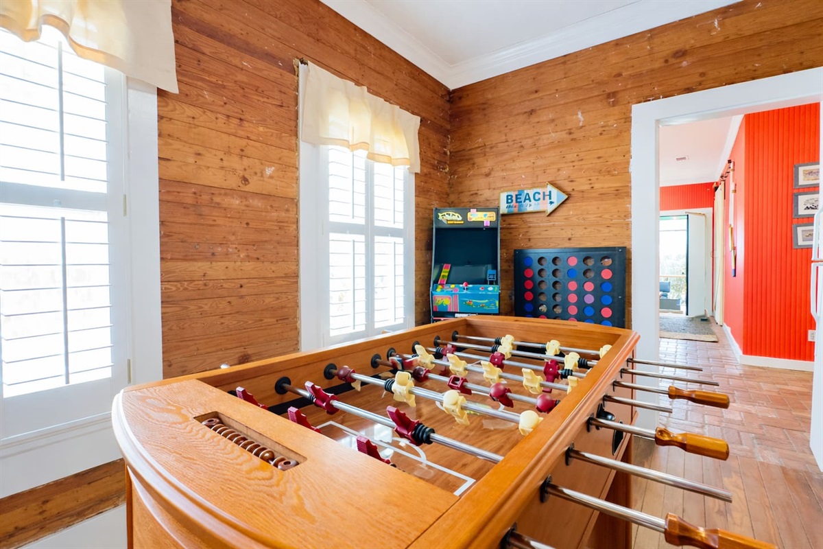 Play, sip, and unwind with foosball, arcade & board games