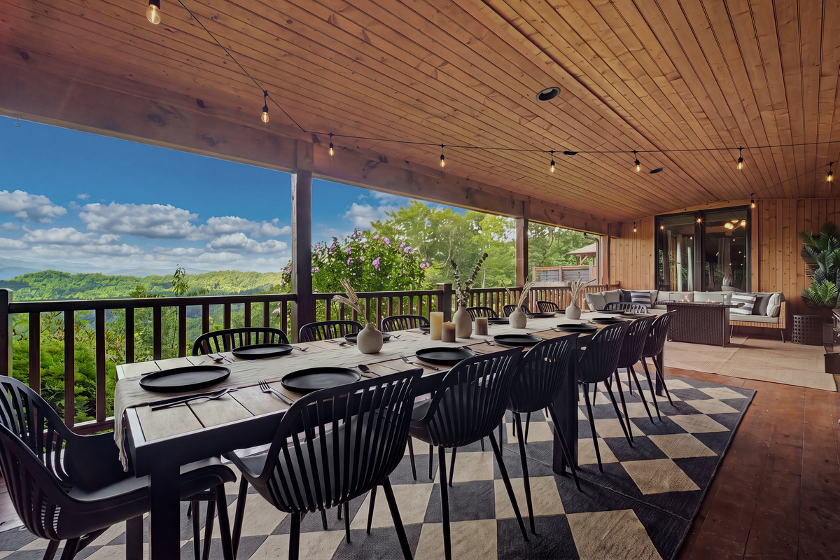 {Al Fresco Dining} Gather together with outdoor dining seating for up to 14, fire up the propane grill, enjoy a beverage from the drink cooler, or relax by the fire pit surrounded by peaceful forest views.