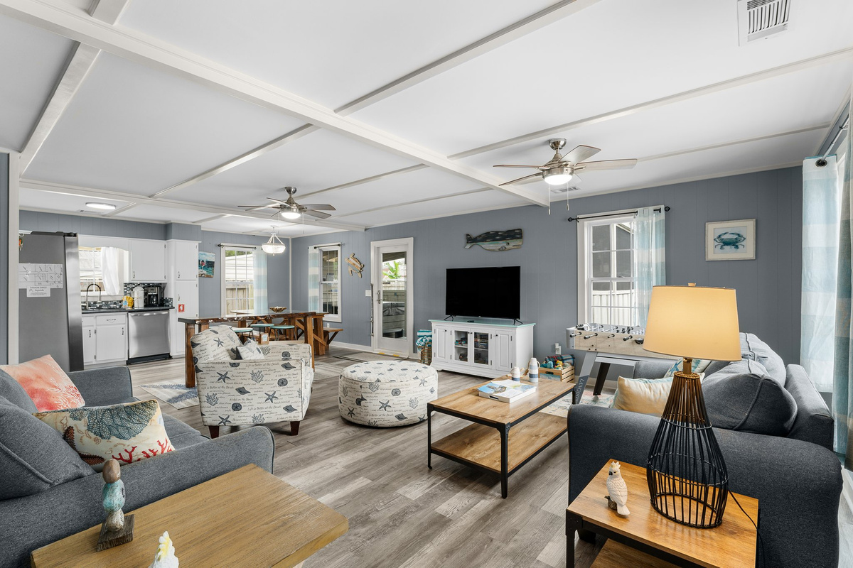 Great room, coffered ceiling, foosball, dining