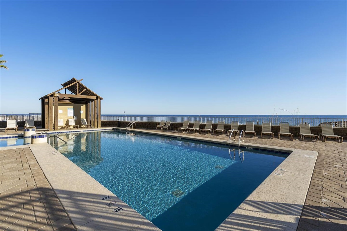 Outdoor pool, includes lounge chairs for your use.