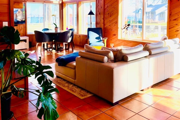 Comfortable living room with cozy seating and beautiful lake views.