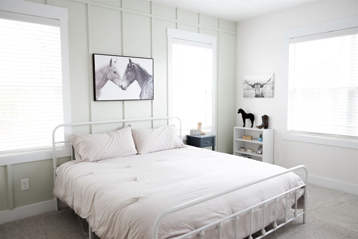 Welcome to Kentucky! This western-themed room is definitely a taste of the bluegrass. Private sink and makeup vanity with shared access to private toilet and shower with bedroom #4. Desk and chair available.