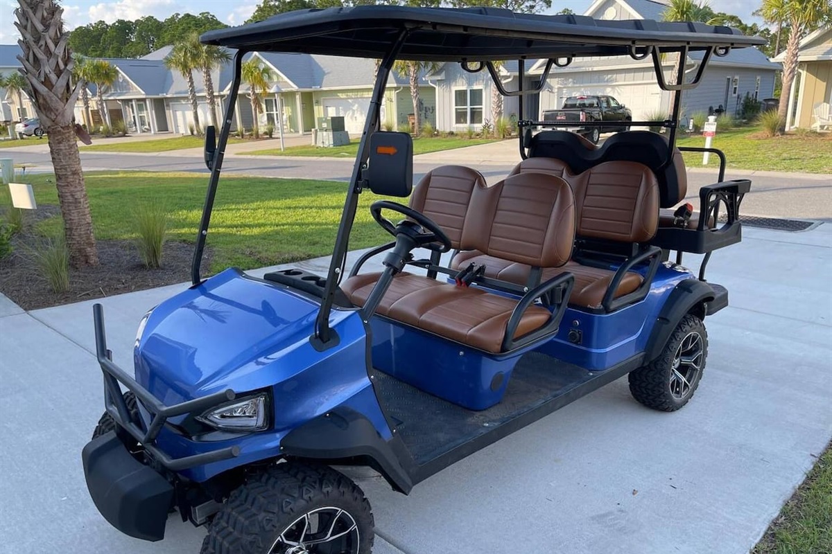 Included in your stay, 6-seater golf cart delivers a smooth ride to town.