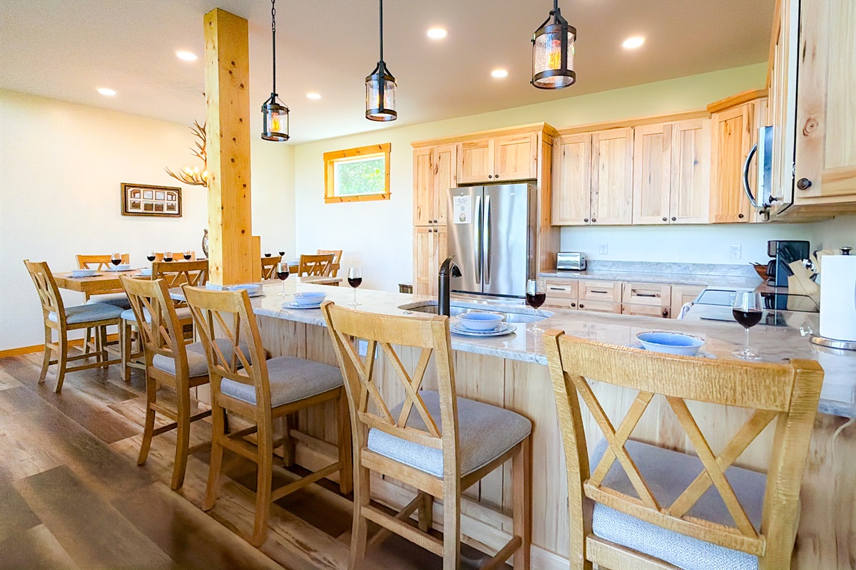 Bar top seating. Granite countertop tops perfect for morning coffee of additional seating for larger familes.