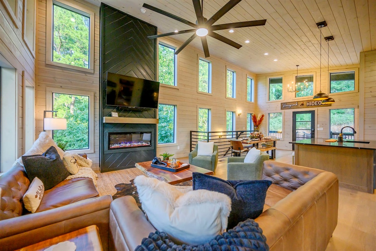 Huge vaulted ceilings and lots of windows gives you that feeling of being inside of a treehouse!