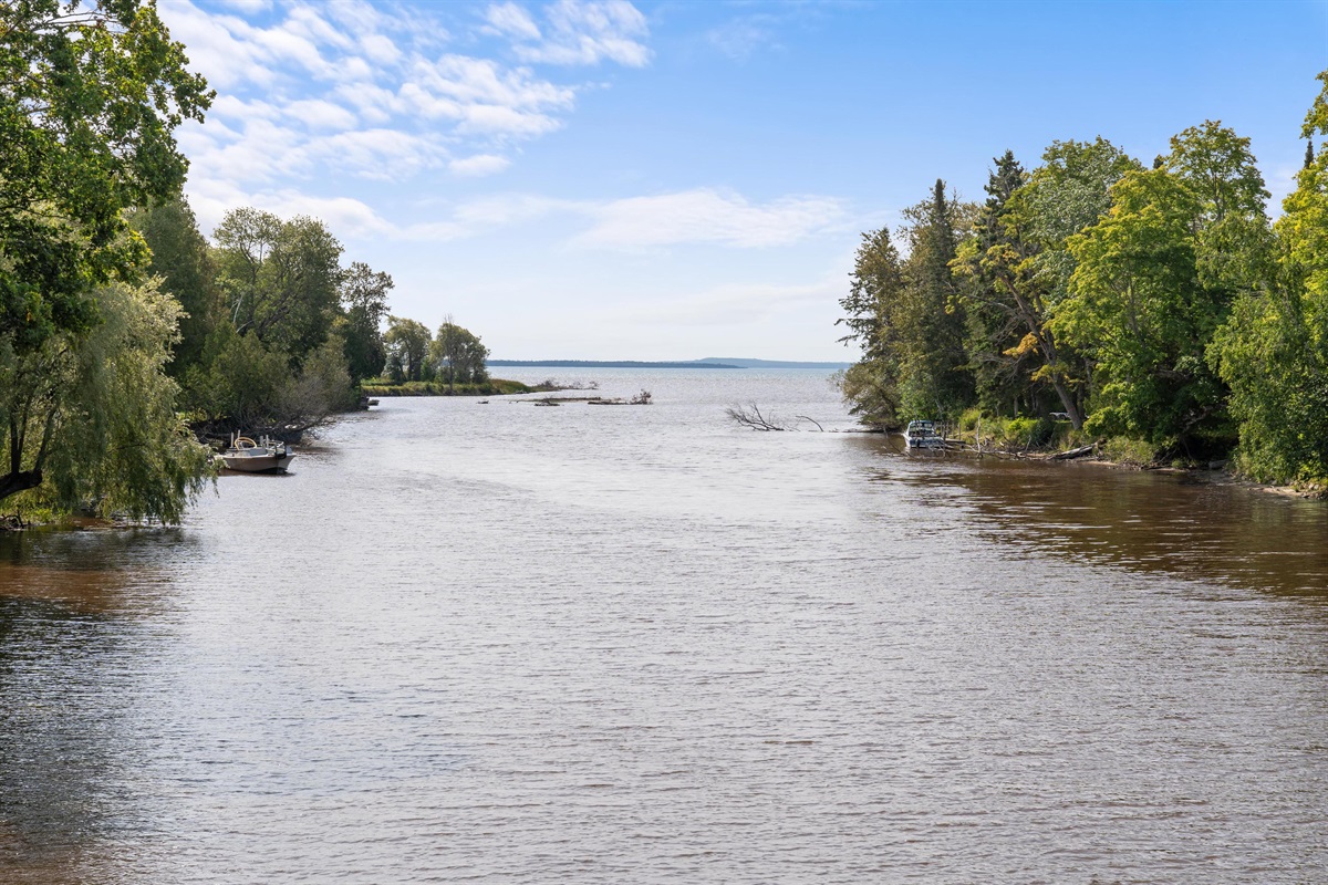 Slow moving Pine River leads out to Lake Huron just down stream