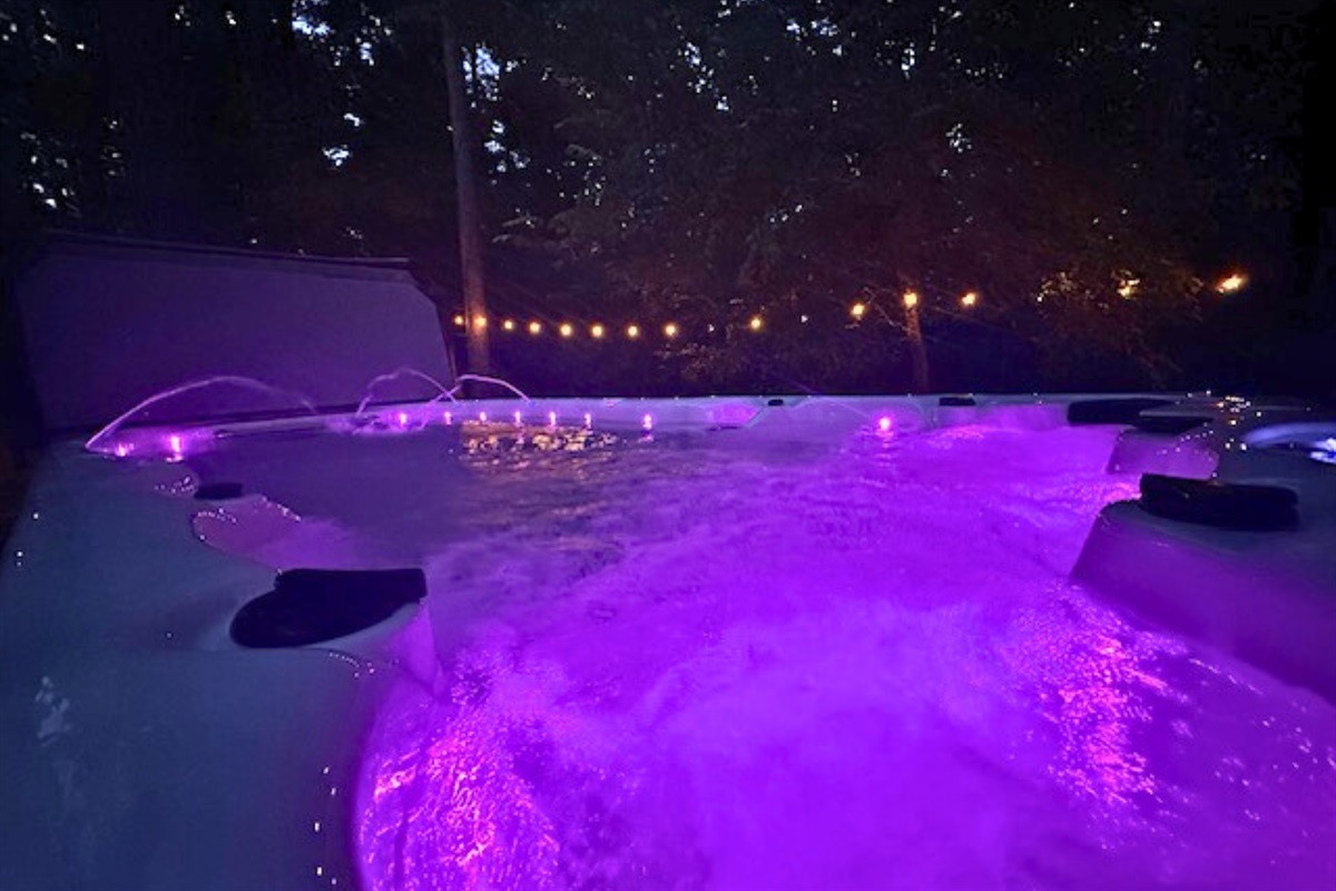 Relax in the swim spa with soothing jets and colorful LED lights, the perfect way to unwind under the stars.