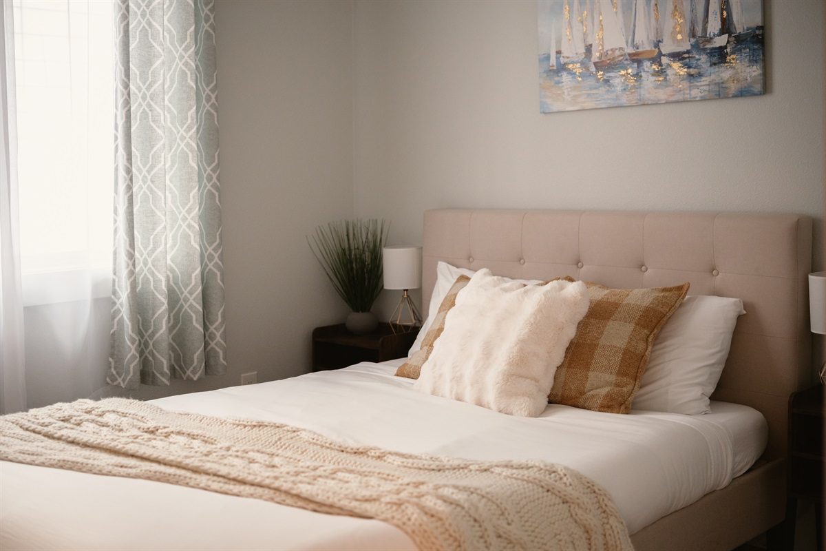 Queen bedroom with medium soft mattress. All of our sheets are hotel grade Egyptian cotton 400 thread count because great sleep matters while you are on vacation.