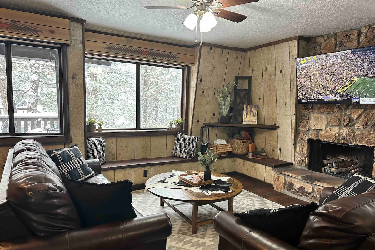 Beautiful views on a snowy day, cozy up by the fire and watch some football!