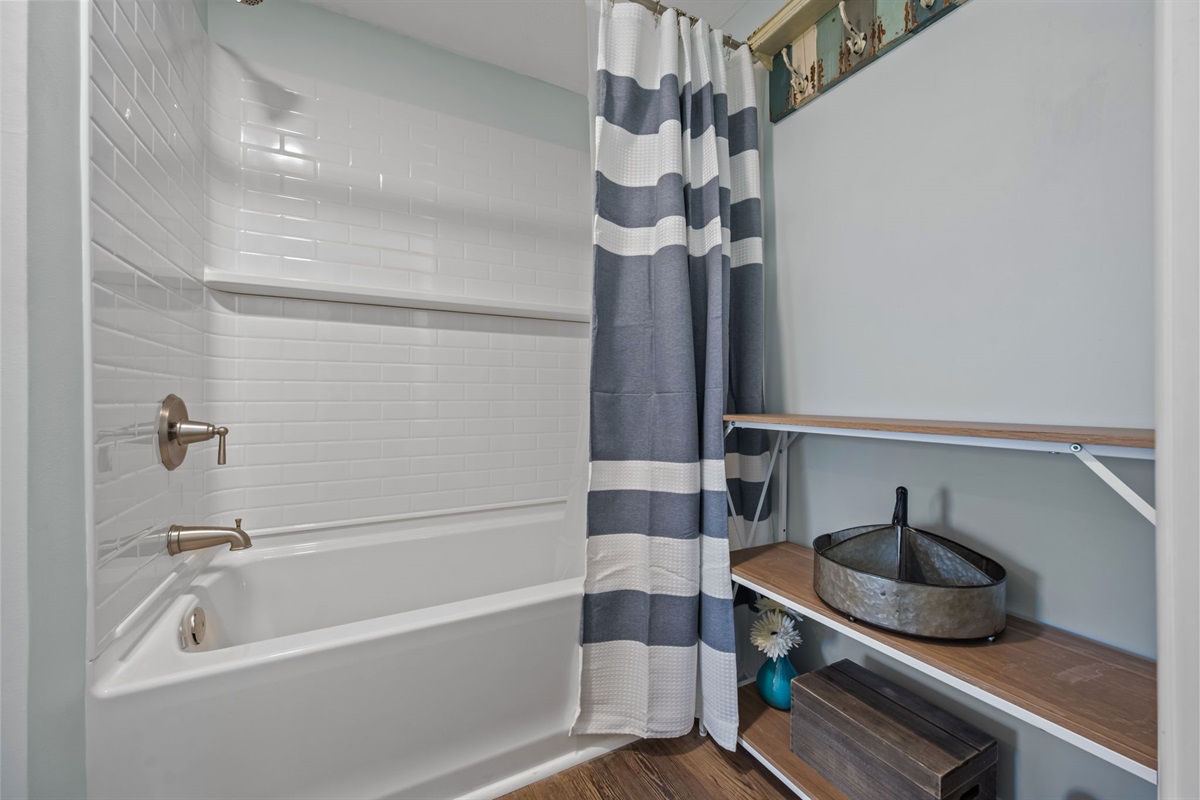 Full tub and shower combo&mdash;perfect for rinsing off after the beach