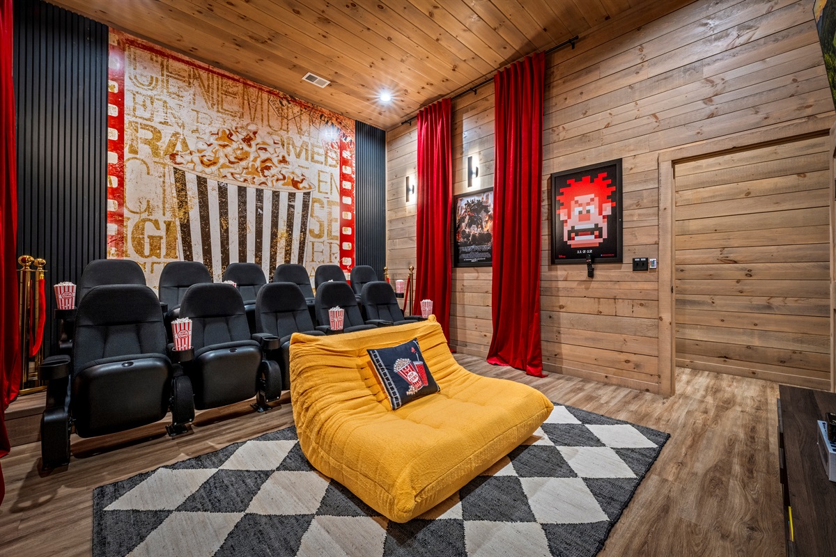 🍿 A theater room that feels like a real cinema—with a touch of playful retro charm. Bonus points for the Mario cameo.