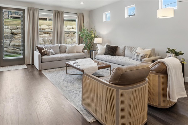 Comfort meets style in the Gather Room with plush seating and mountain-inspired décor.