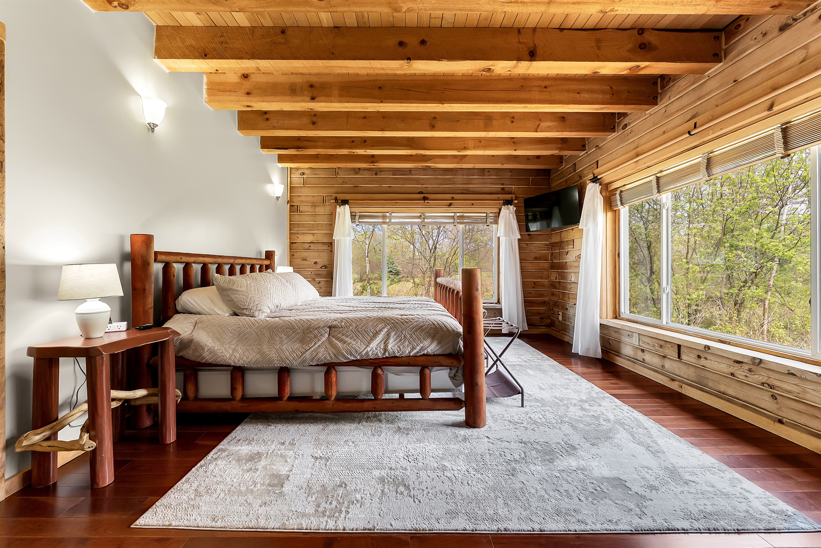 Second master bedroom overlooking the pond.
