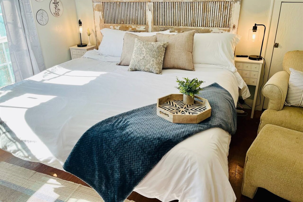 Unwind in your private retreat bedroom with a plush king bed.