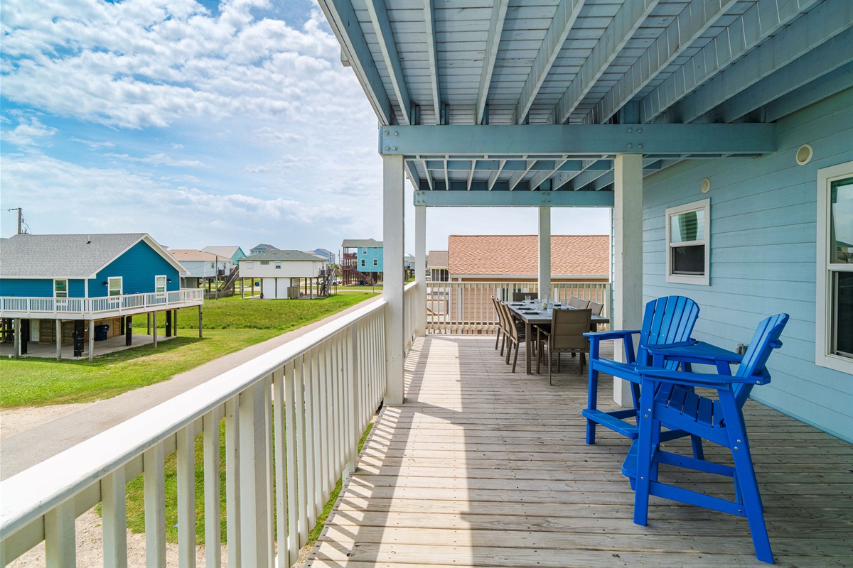 Gulf-facing deck chair — morning coffee spot or sunset read nook. Take your pick.