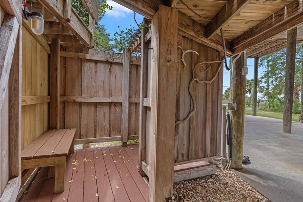 Outdoor shower with hot/cold water shampoo, conditioner and body wash 