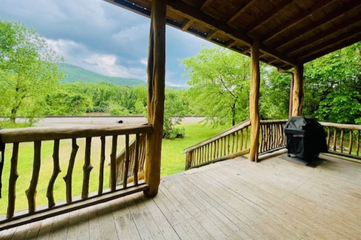 Roomy front porch with a gas grill. Yoga anyone?