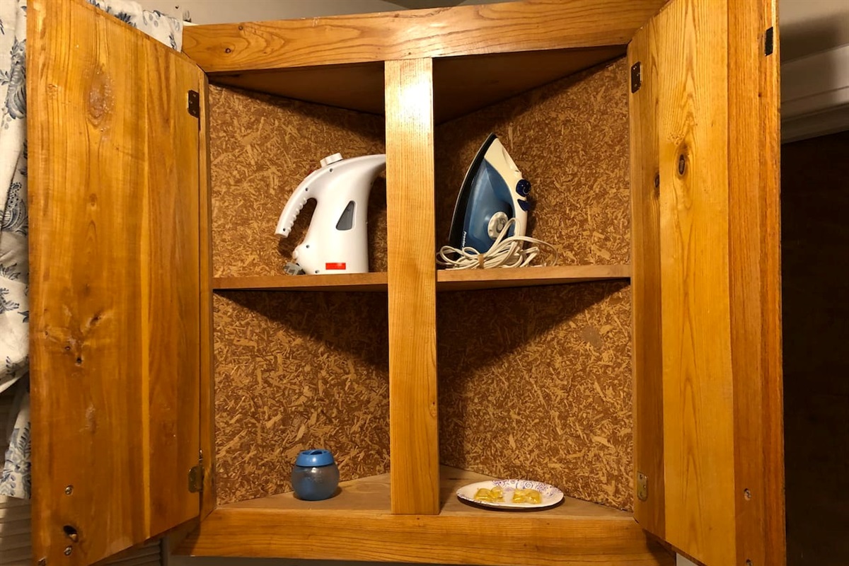 Linen/clothing steamer, iron and downy ball available for use. There  are 2 complimentary laundry detergent pods provided to get you started!