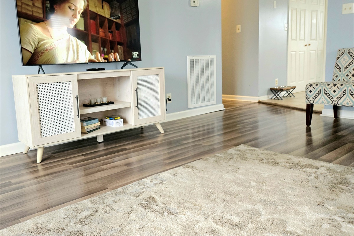 Spacious living room with elegant features and comfortable seating. High Speed WIFI, smart TV and keyless entry included.