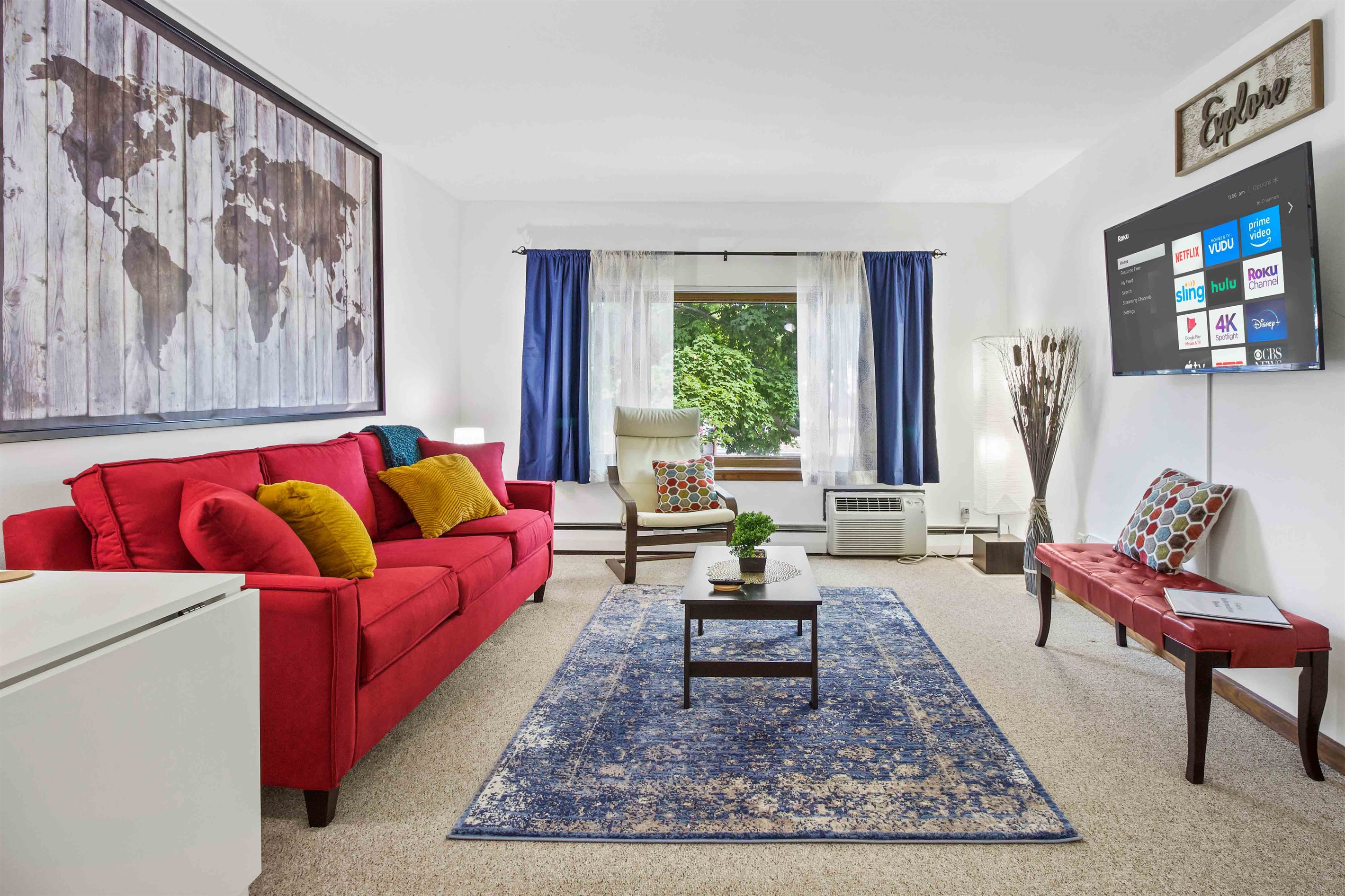 Spacious and bright, the living room offers a comfortable place to relax