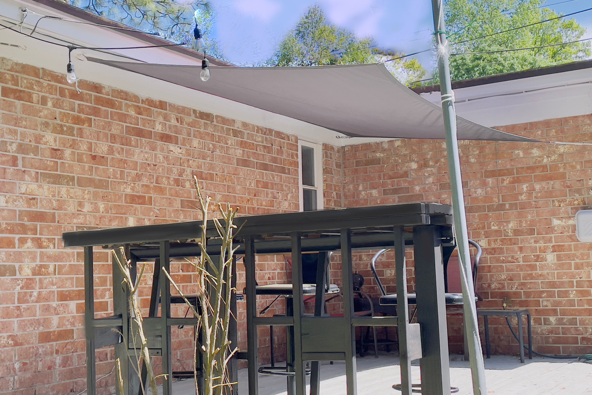 Patio has 2 small tables & chairs; we also have a bar-high table with 3 stools.