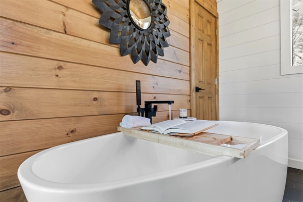 Sink into this deep soaking tub and feel your stress melt away while staring at the beautiful mountain and pasture views.