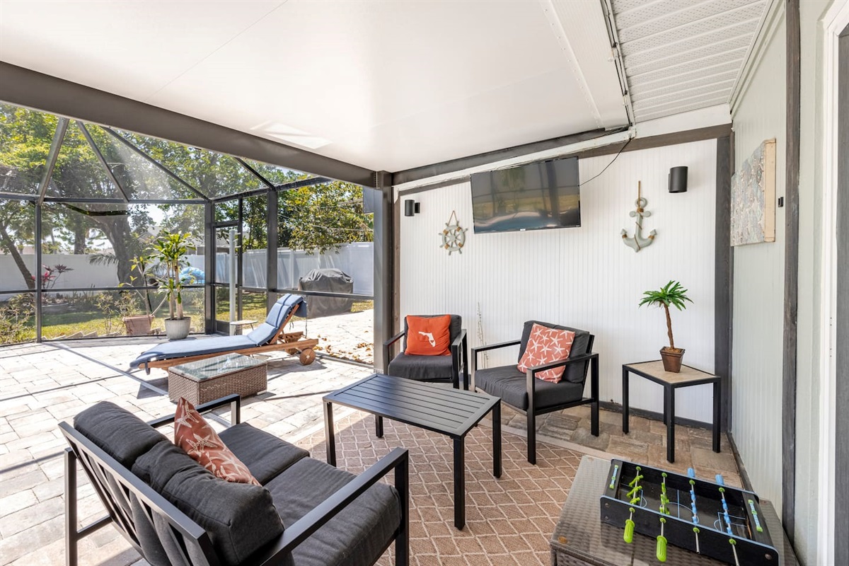 Chill area to relax in the shade and listen to  or watch the game on the outdoor smart tv with friend/family