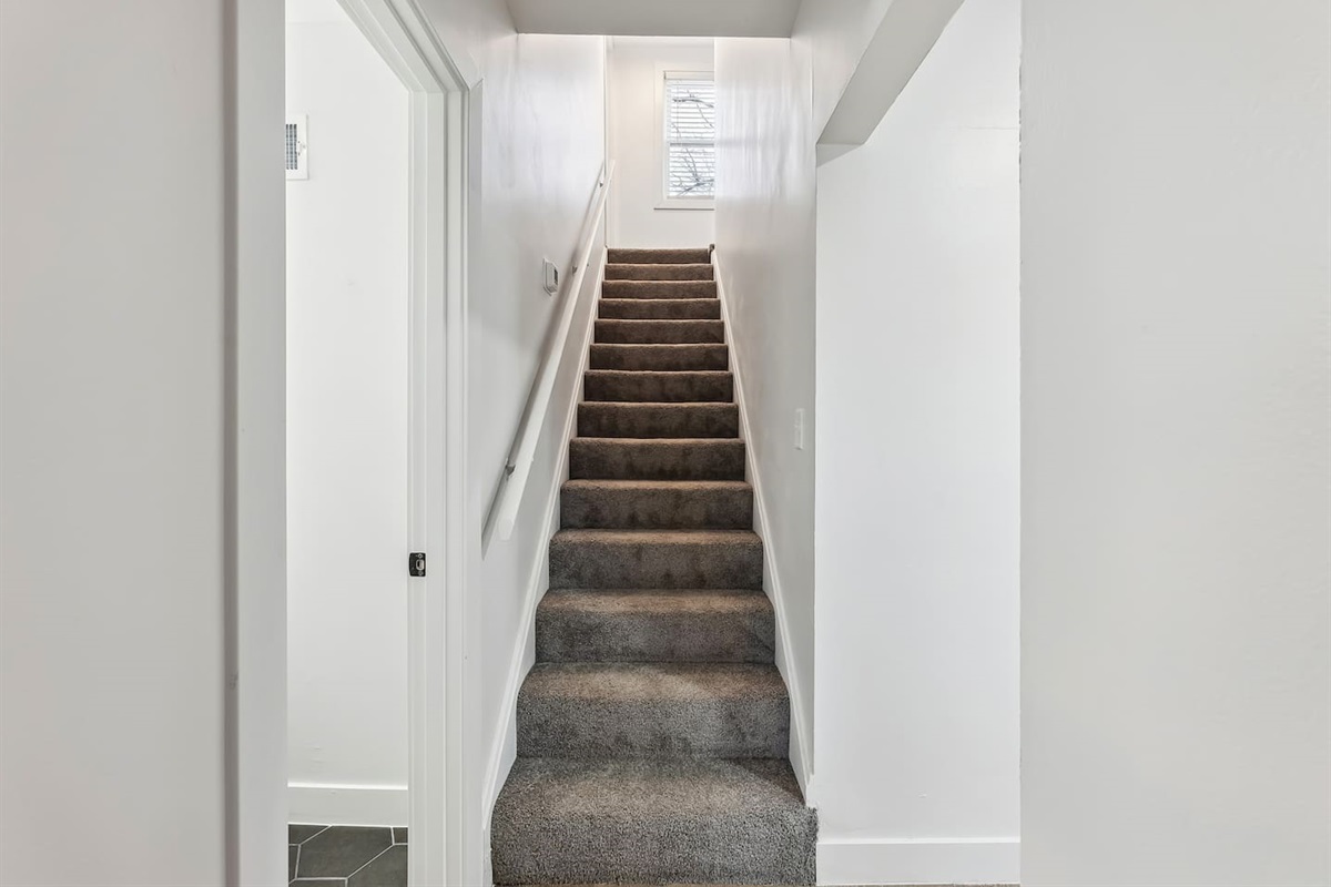Stairs leading up to the king bedroom.
