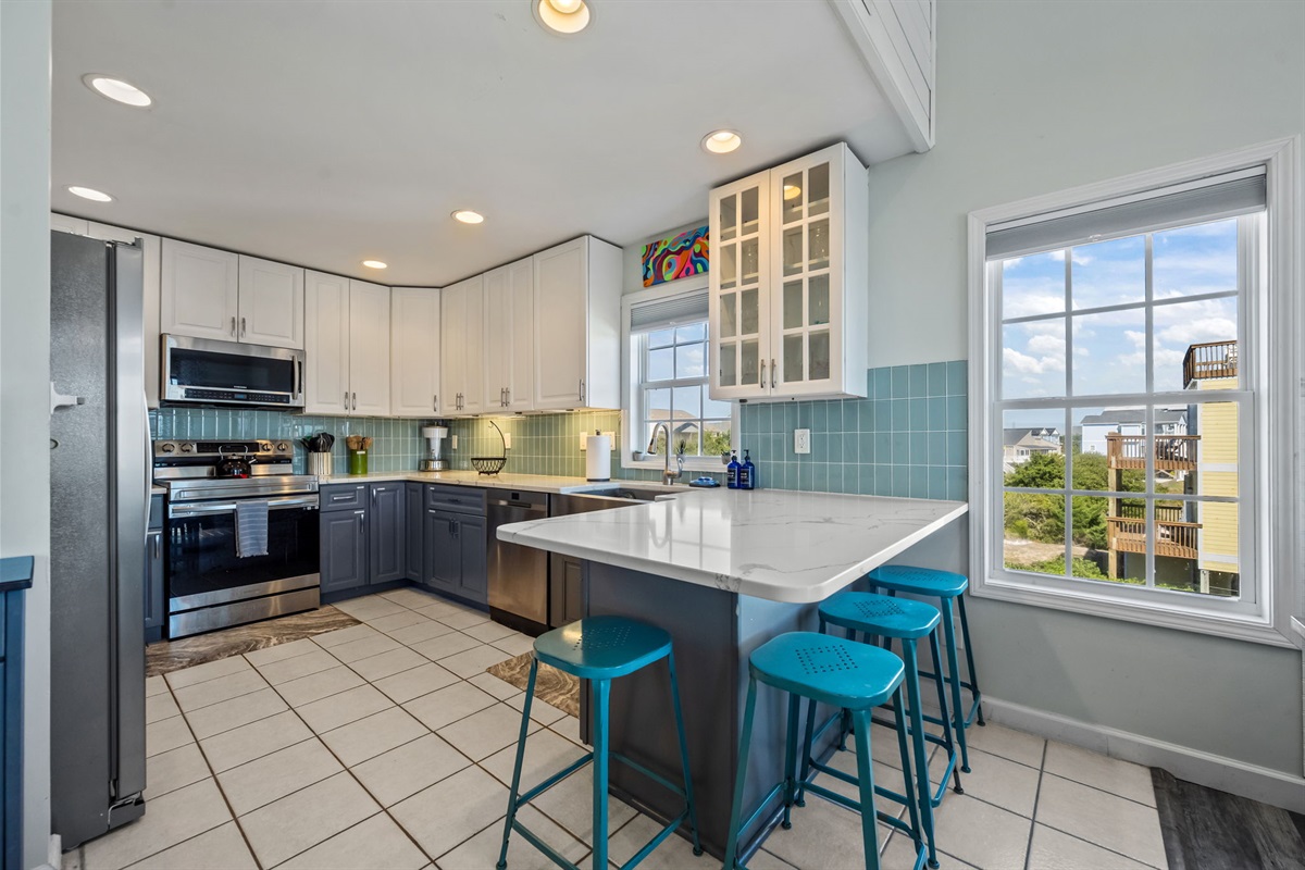 Fully equipped kitchen with everything you need to fuel beach days, from quick breakfasts to family feasts.