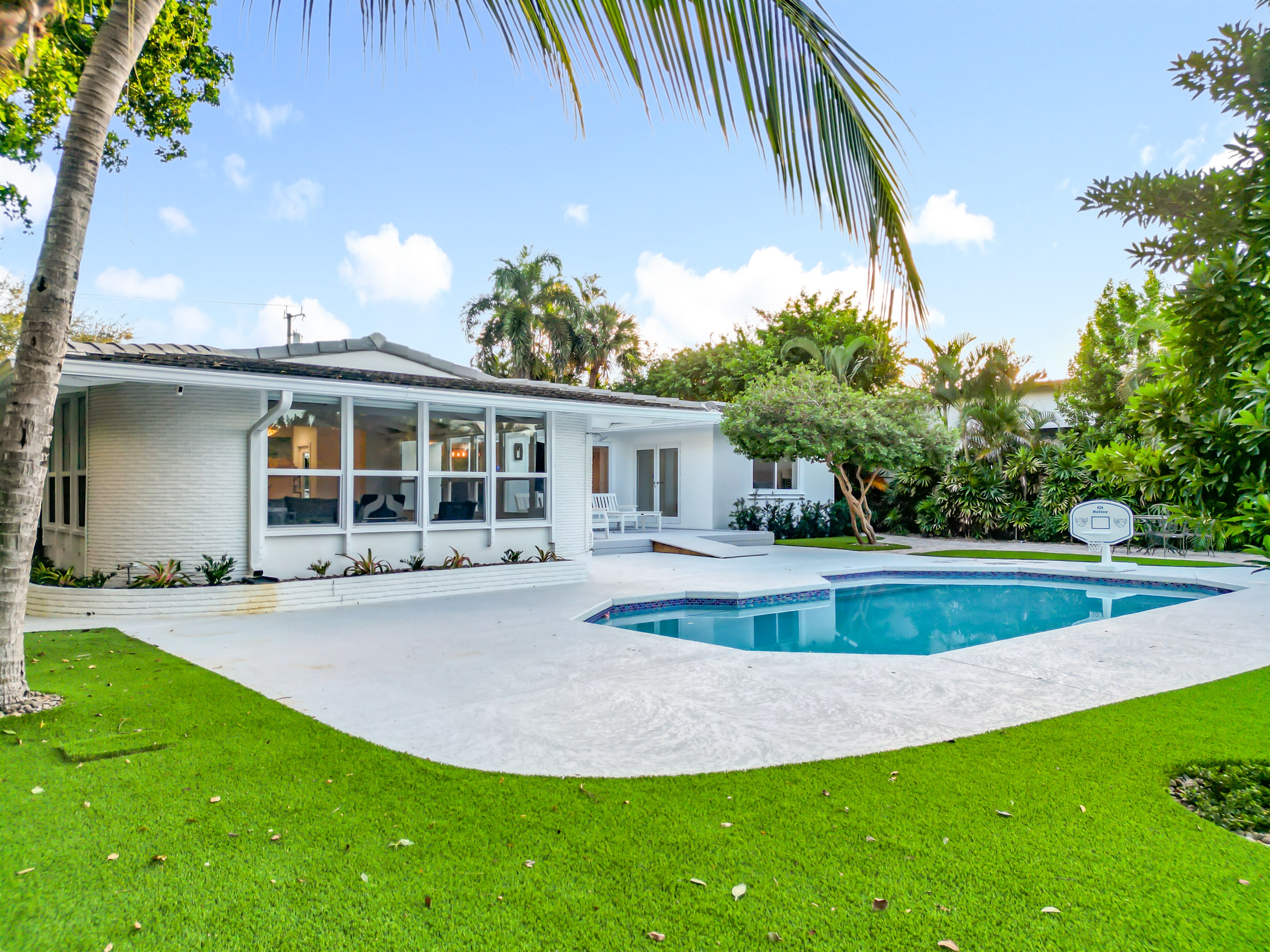 The artificial turf extends out the pool deck and usage. 