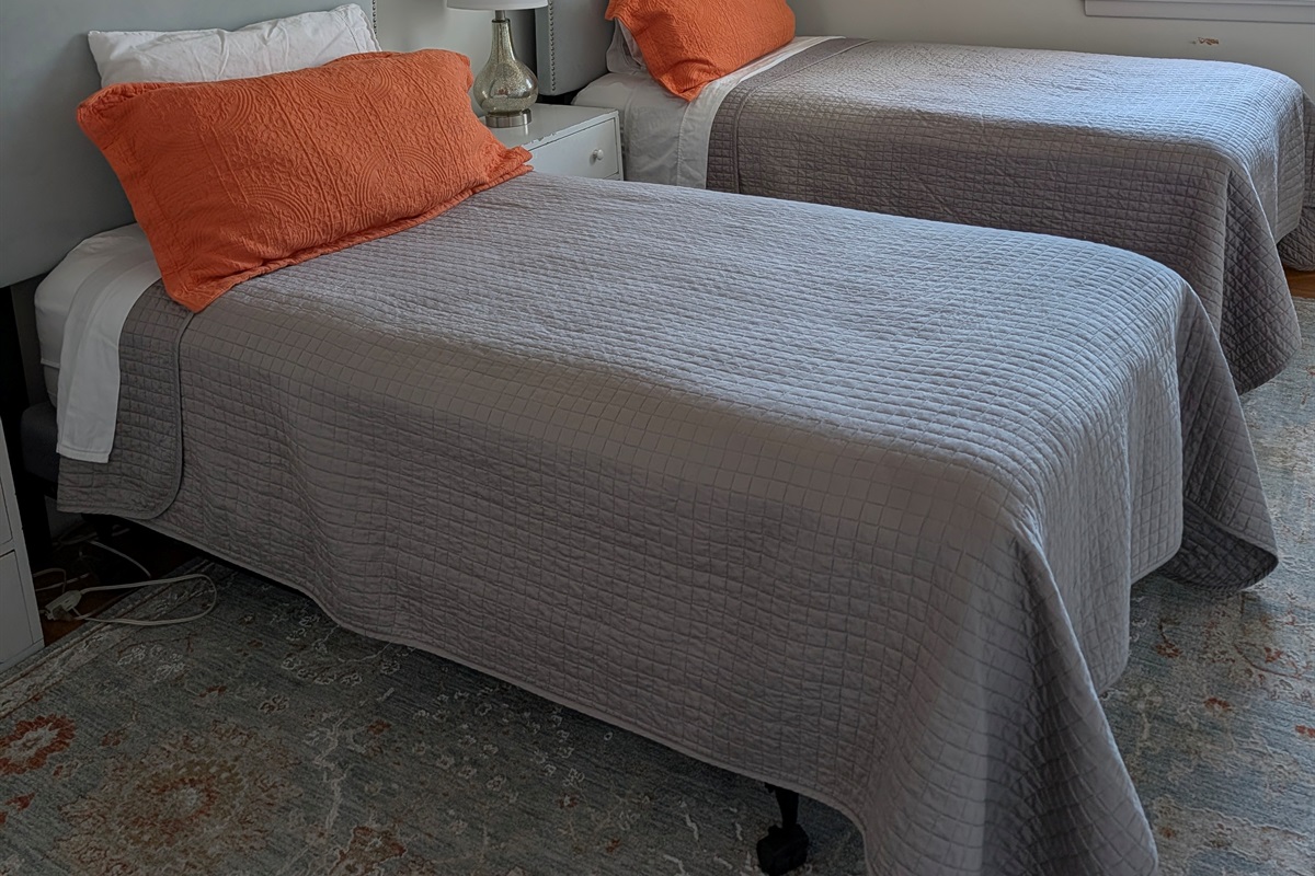 third bedroom . The twins can go together to form king bed