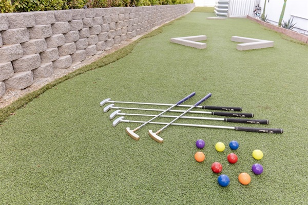 Extended 45 foot six-hole mini golf - with obstacles and tunnel finale